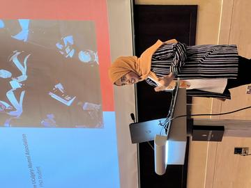 Alumna addressing the gathering