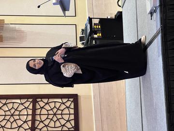 Alumna addressing the gathering