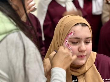 Face painting at the welcome back event